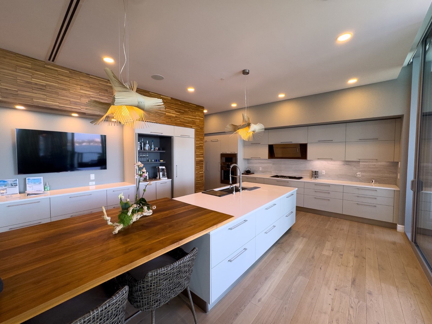 Modern kitchen with a long island and warm wood accents